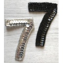 Numero 7 in paillettes e perline nere